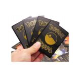 Pokemon kortos 165 vnt. kolekcija Charizard Vmax, juodos, auksinės ir sidabrinė spalvos pakuotės po 55 vnt. Pokemon kortos 165 vnt. kolekcija Charizard Vmax, juodos, auksinės ir sidabrinė spalvos pakuotės po 55 vnt.