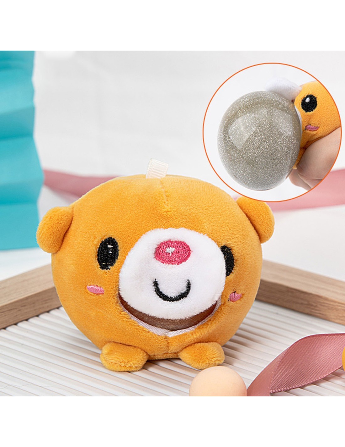 Suspaudžiamas antistresinis fidget pliušo kamuoliukas pakabutis