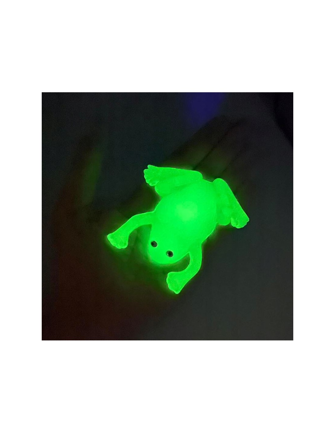 Sticky limpanti varlė, šviečianti tamsoje Sticky limpanti varlė, šviečianti tamsoje