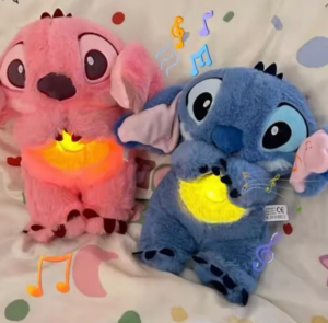 Migdukas STITCH pliušinis žaislas su lopšinės garsais rožinis